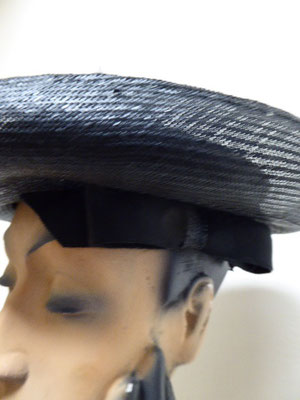 FORTIES - Black straw saucer style with lovely bow under the brim. €65