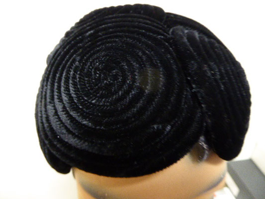 Forties hat - 6 circles of patterned black velvet, joined on velvet-covered hat wire form a little head hugger. €130