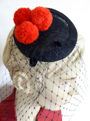 Black Forest with red pom poms and spotted tulle....... €59