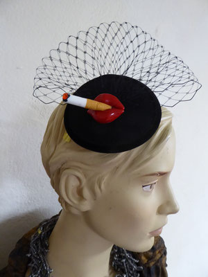 €75 black base, black tüll and a comb on back.....Lips with cigarette 