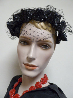 Forties black cellophane matador-style hat with veiling. €49