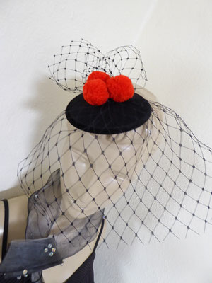 Black Forest with red pom poms....... €59