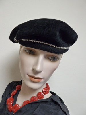 Forties black velvet beret style. Rhinestones. Interesting shape. Lovely condition. €95