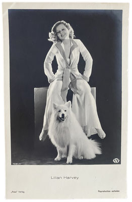Lillian Harvey and a large Spitz