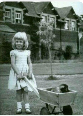 Princess Diana with Wolfsspitz puppy