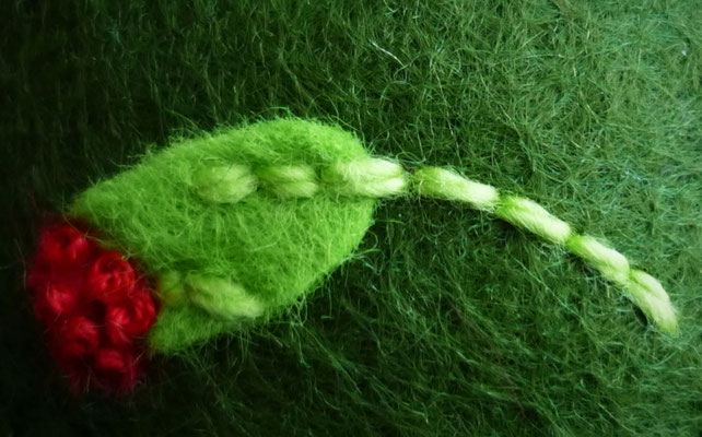 Green wrist pincushion with red poppies