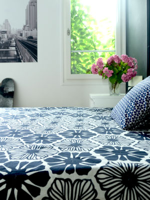 Handcrafted blockprint blanket featuring organic cotton, made in Delhi.