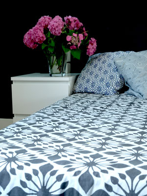 Unique blockprint design on a cozy blanket made from organic cotton in Delhi.