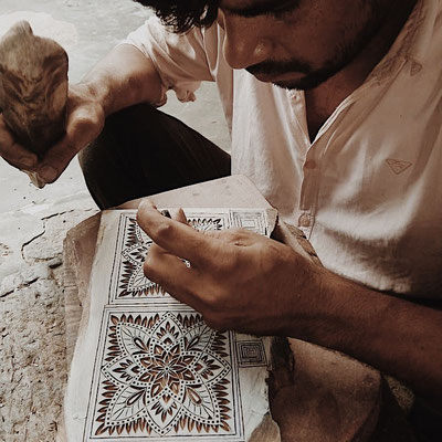 Crafting wooden printing blocks in India, offering customized large printing stamps, all meticulously hand-carved