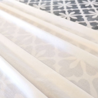 Experience the purity of our white organic cotton fabrics, exclusively available at our factory shop at Arakashan Road Pahar Ganj, Delhi, India.