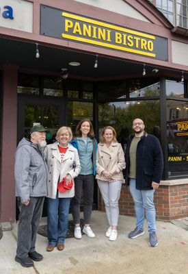 Group posing outside Panini Bistro