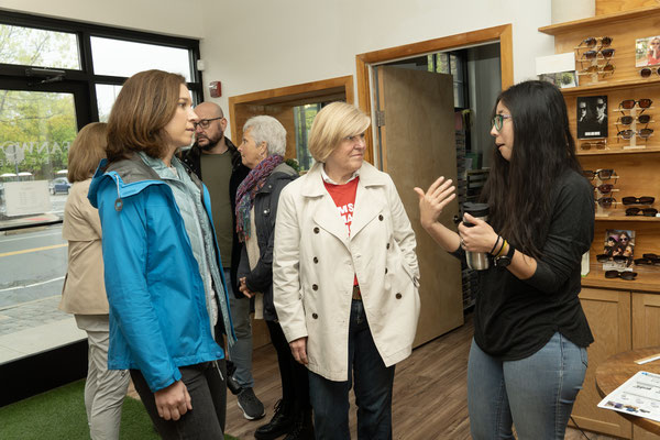 Dr. Shin gives the mayor and Rebecca a tour