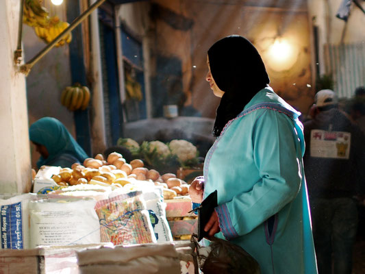 Moroccan woman at market 21x15