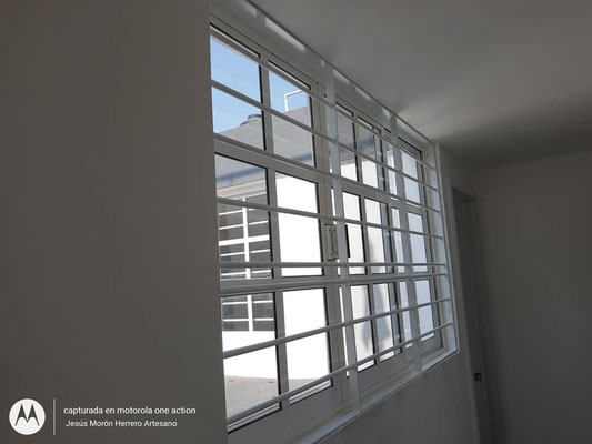 Protecciones para ventana con redondo sólido y Marcos de solera 4.6 HERRERÍA ESPECIALIZADA MORÓN 