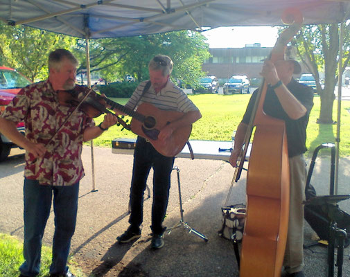The bluegrass band entertains at the annual ice cream social with leader, Dan Beukema   [photo by Arlene]