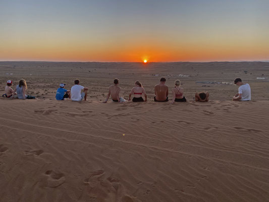 Students waiting for a sandworm.
