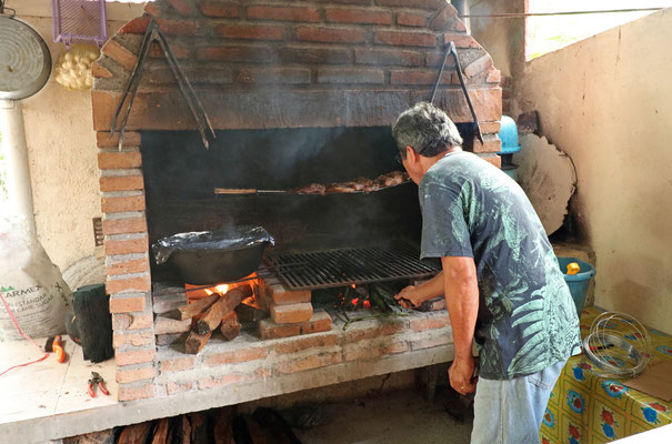 Our host preparing lunch.