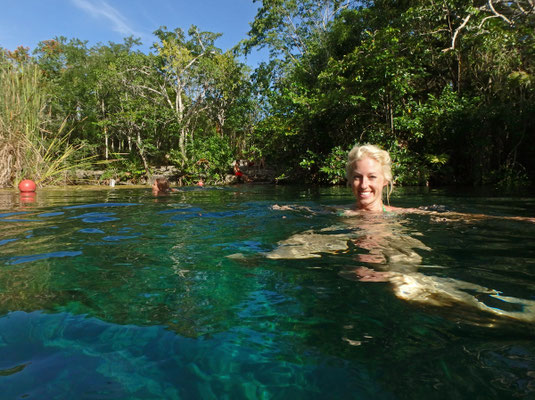 Laura enjoying the cool water of the cenote.