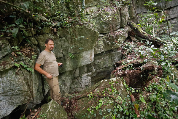 Joachim in front of the cave entrance.
