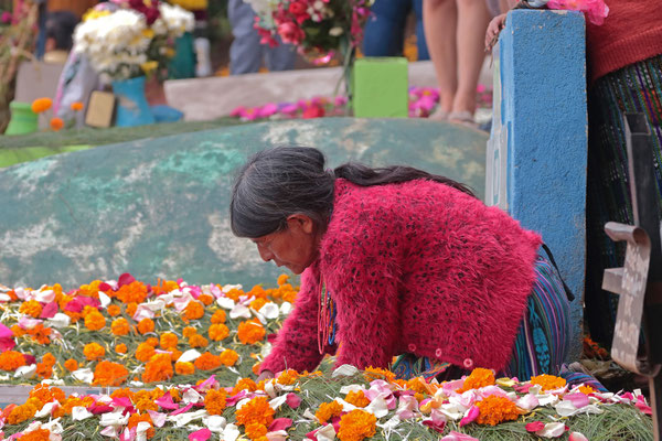 With meticulous care people were decorating the graves of their loved ones.