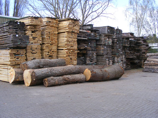 Yard with round logs and lumber in Hamburg, GERMANY