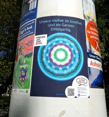 Plakat für Open-Air-Ausstellung im Öffentlichen Raum in Bonn, von Susanne Barth. Eine Aktion des Caritasverbands für die Stadt Bonn e.V.