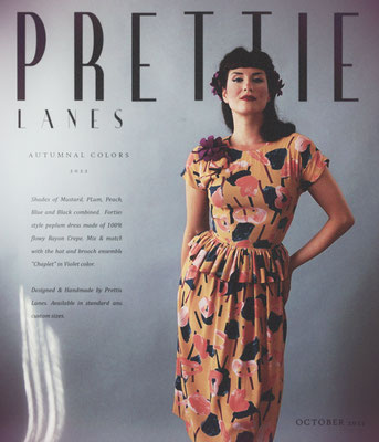 Signature vintage inspired ad by Prettie Lanes. 1940s style peplum Rayon dress in wonderful shades of Peachy Mustard, Navy, Black, Purple and Peach.