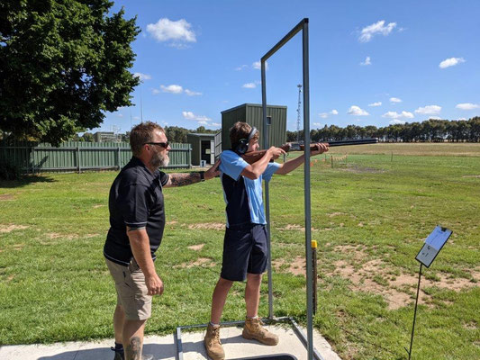 2021 12 09 Student Charlie Suffern was fortunate to have someone of Scott Henshall's calibre (Gun Pun!) on hand to introduce him to clay target shooting.