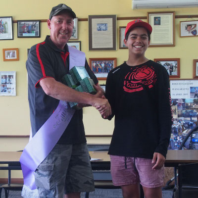 C Grade winner, Col Crittenden, being congratulated by substitute Pres. Mattie Motha.