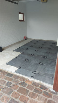 BTK Tegelzetters Venlo - tegelvloer garage te Reuver