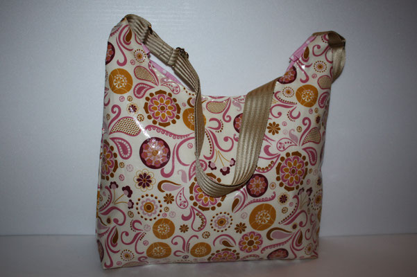 SHOPPER aus besch. Baumwolle rosa/braun/beige-farbene Blumen auf naturfarbenen Grund - Innen mit besch. Baumwolle rosa mit weißen Punkten ausgekleidet - Magnet-Verschluss - Einstecktasche im InnerenMaße: ca. 26 cm hoch x 35 cm breitx 6 cm tief- SALE 39/59