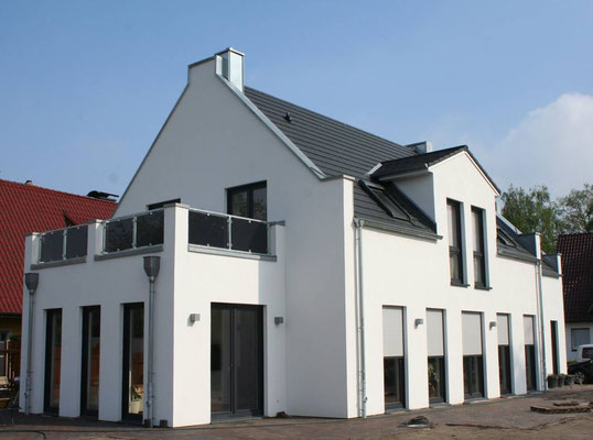 Englisches Landhaus in Bremen mit überbauten Giebeln, Dachterrasse, auf 180m²