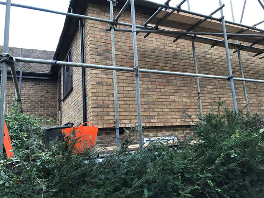 Installation of the BrickCloak cladding system adopting buff brick slips.
