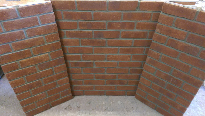 Fireplace chamber lining panels. Stretcher Bond. Durham Red Multi brick slips.