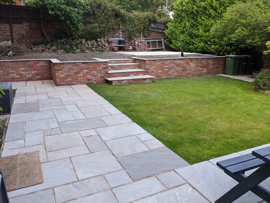 Red brick slips installed on retaining wall