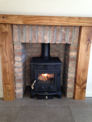 4-piece fireplace chamber set. Retro Barn Stock brick slips. Wooden Fire surround.