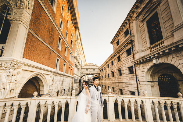 Venice wedding photo in a campo with historic architecture in the background