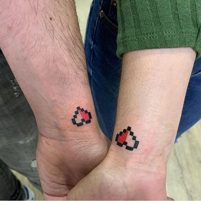 tatuaje corazón pixels