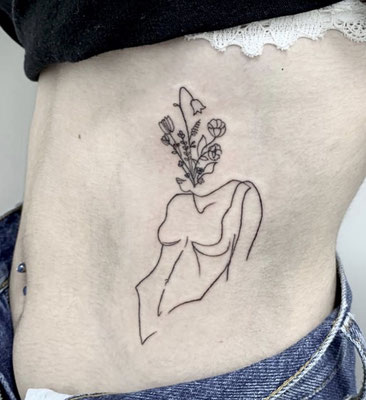 chica flores tattoo