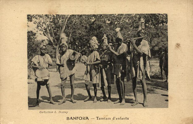 Youth musicians in Banfora (eastern Burkina Faso), with jembe, tama, and flutes