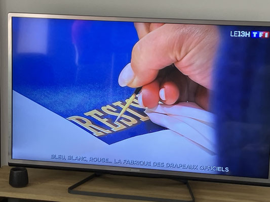 Les travaux sur le drapeau montrés dans un reportage au 13h00 de TF1 le 13/07/2026