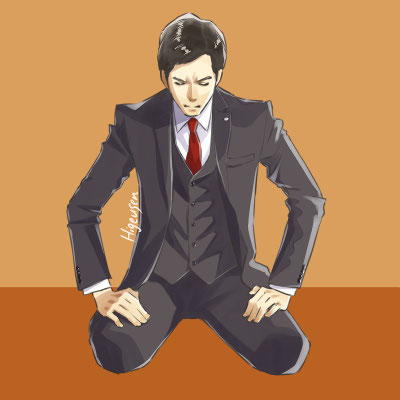 座るスーツ