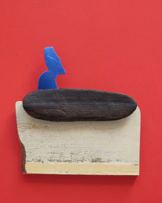 Figuur in bootje 21x21cm 85,-