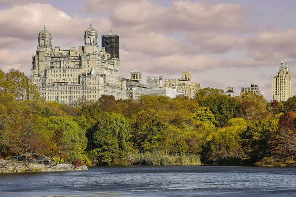 New York City in Summer on the Lake with Central Park West Skyline and the Dakota Apartments, New York, USA