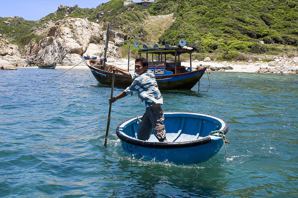 Vietnamese fisherman in his floating basket, Vinh Hy, Vietnam, Asia