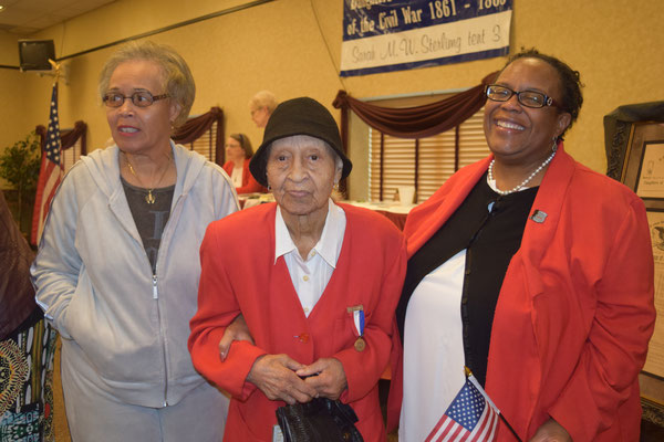 Oldest Tent 3 member, 104 year-old Ada Maxwell, with daughter Carol, congratulate Yulanda Burgess