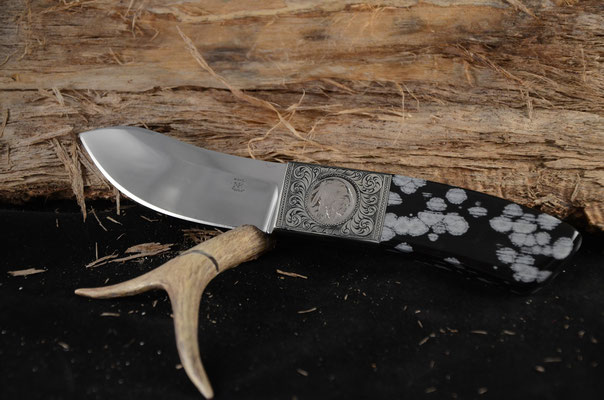 #86 Green River Skinner.  Blade length 4" Overall 9" 440c steel.  Handle snowflake coral.  Engraved nickel silver bloster with Indian head nickel on one side and buffalo on opposite.  Maker RD Nolen.  This is Not for Sale.  