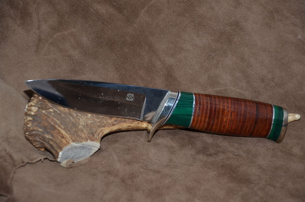 #80 Blade 4 3/4" Overall 9 1/4"  Handle - leather spacers with malachite.  Nickel silver guard and butt cap  $325