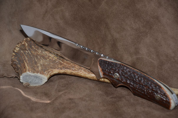 #60 Full tang drop point with two finiger grooves and filework. 440c steel.  Handle axis horn.  Maker RD Nolen  $265