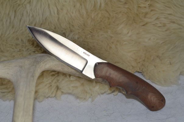 #19 2-finger sheeps foot skinner.  Blade length 4" Overall 8 1/4" d2 steel.  Handle brown canvas macarta.  Maker Steve Nolen  $200
